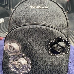 SOLD Michael kors Black Floral Abbey Medium Backpack
